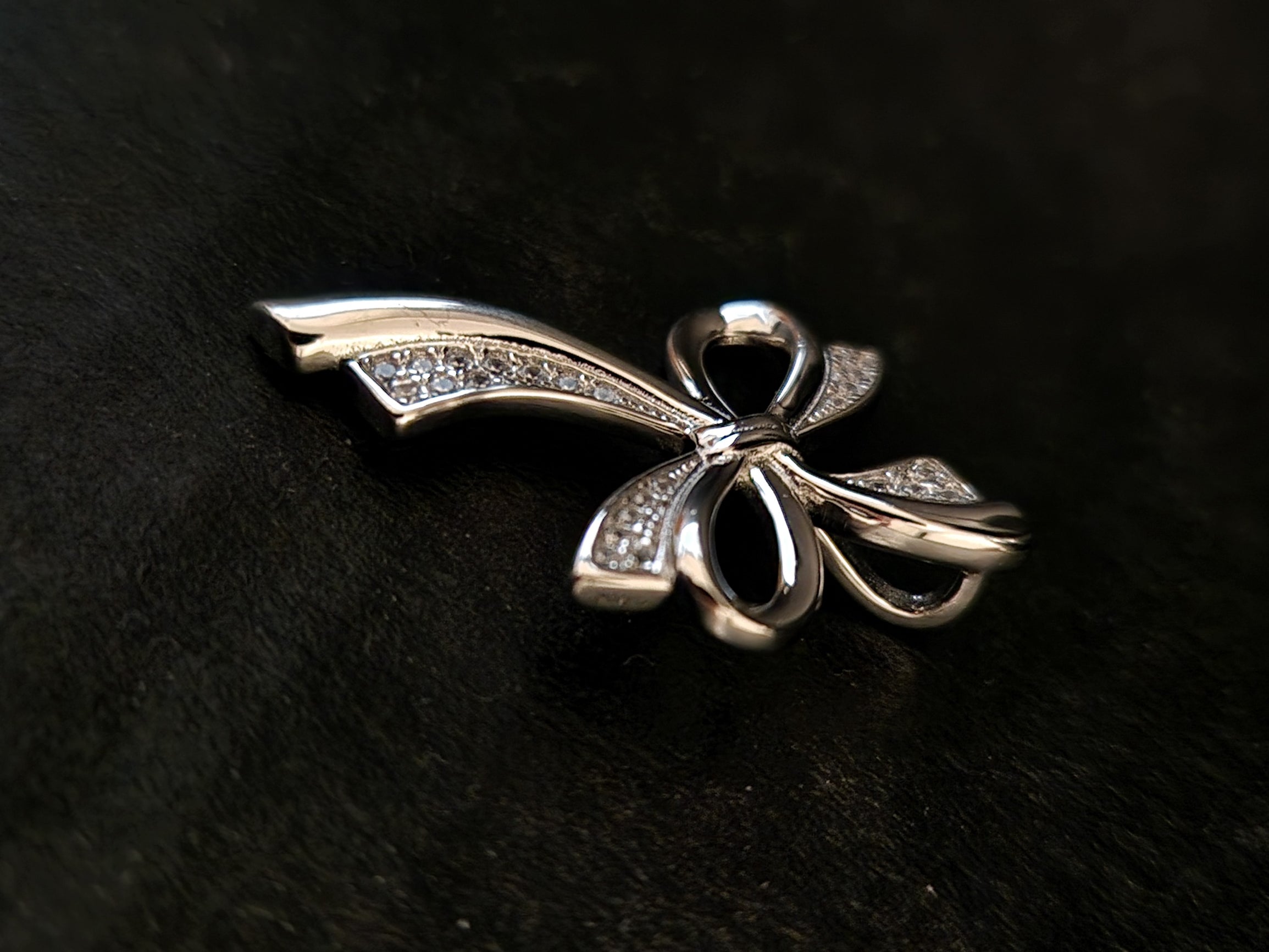 Bow Cross Pendant with White Zircons in 925 SILVER Rhodium Galvanic